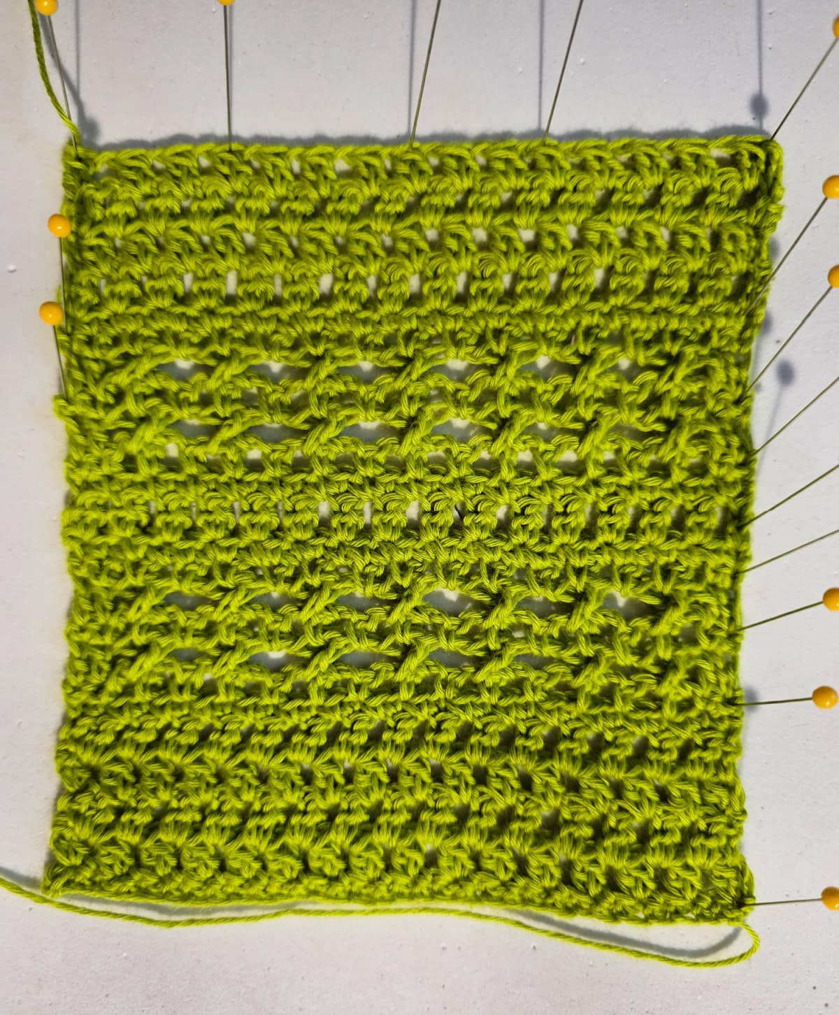 Crochet swatch for green beach pants.