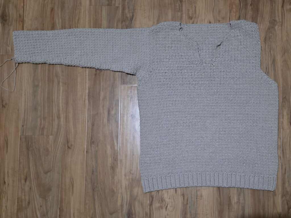 Completed sleeve of the crochet sweater.