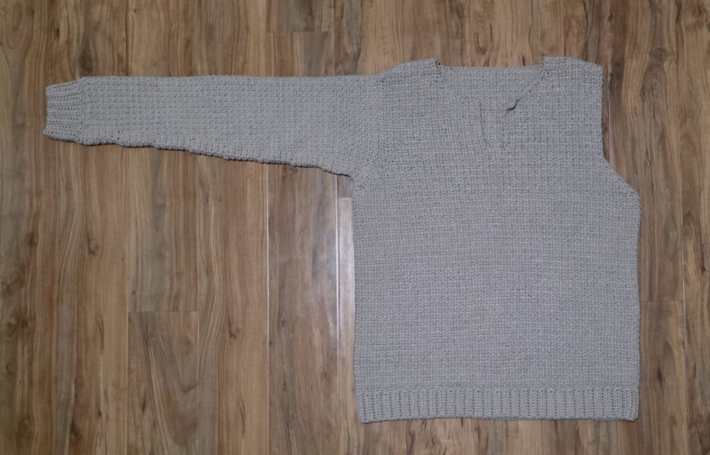 Completed sleeve of the crochet sweater.