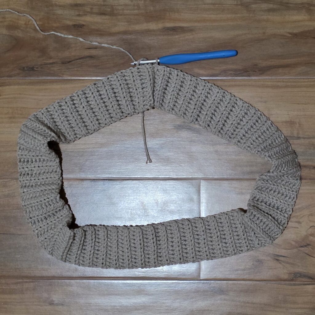 Crochet waistband against a wooden background.