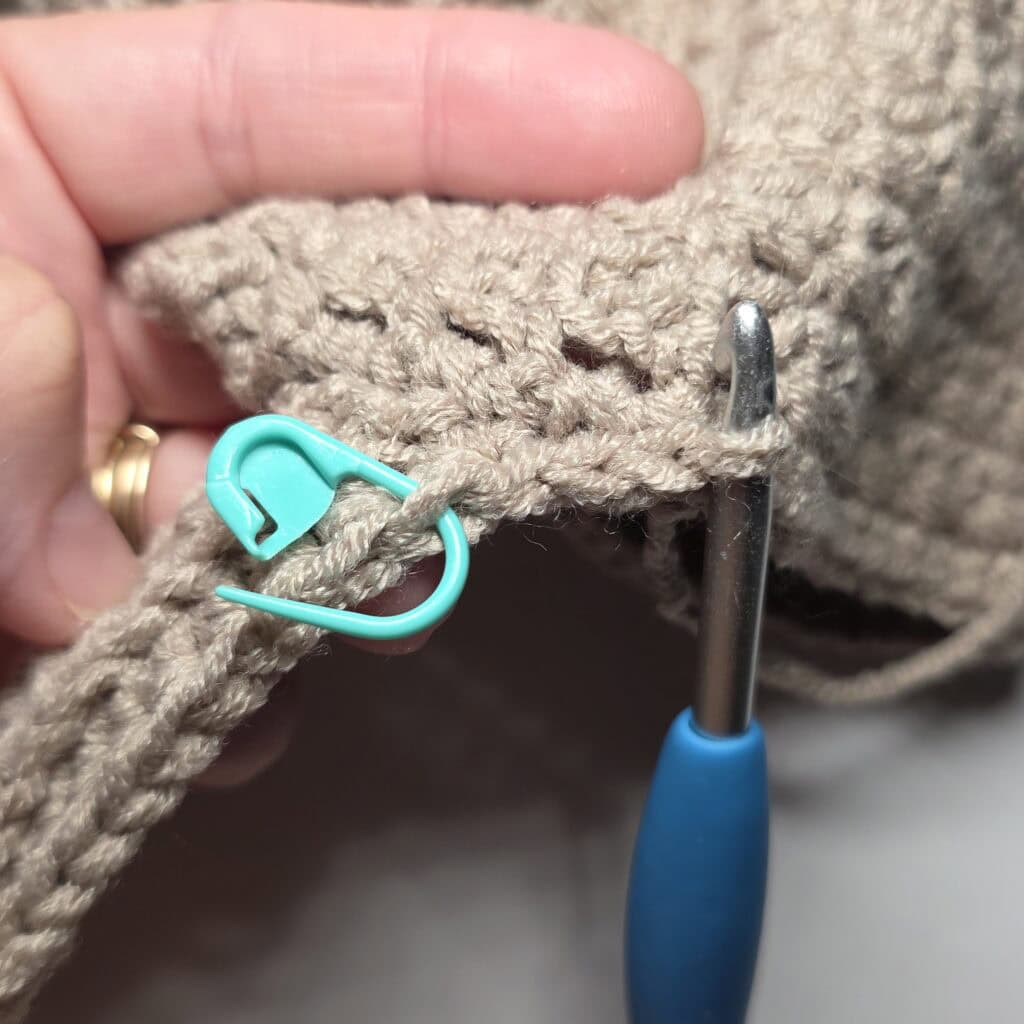 Row 4 of the cuff ribbing for the crochet sweater.