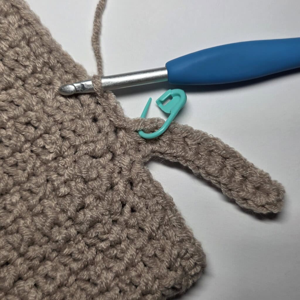 Row 2 of the cuff ribbing for the crochet sweater.