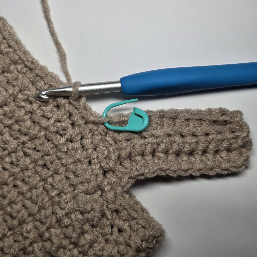 Row 4 of the cuff ribbing for the crochet sweater.