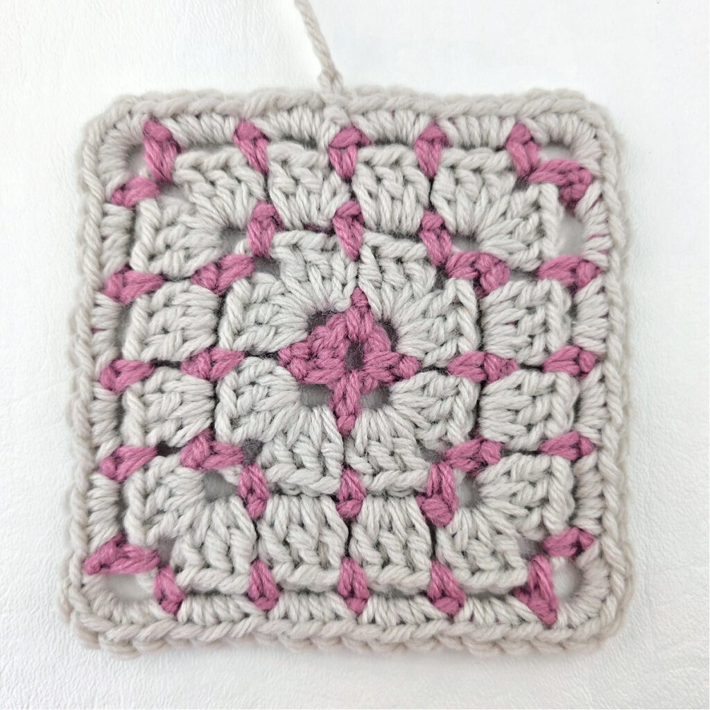 Completed block stitch granny square.