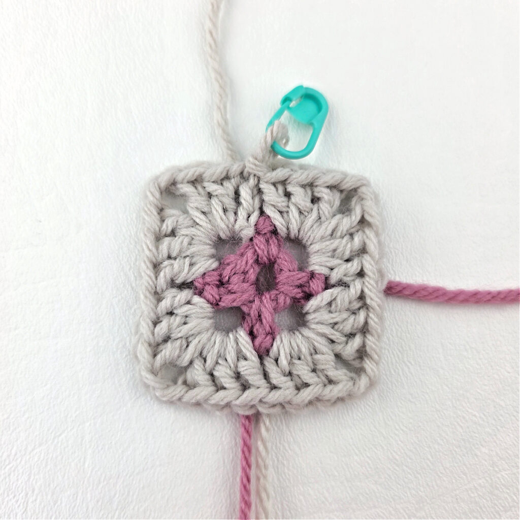 Making a block stitch granny square.