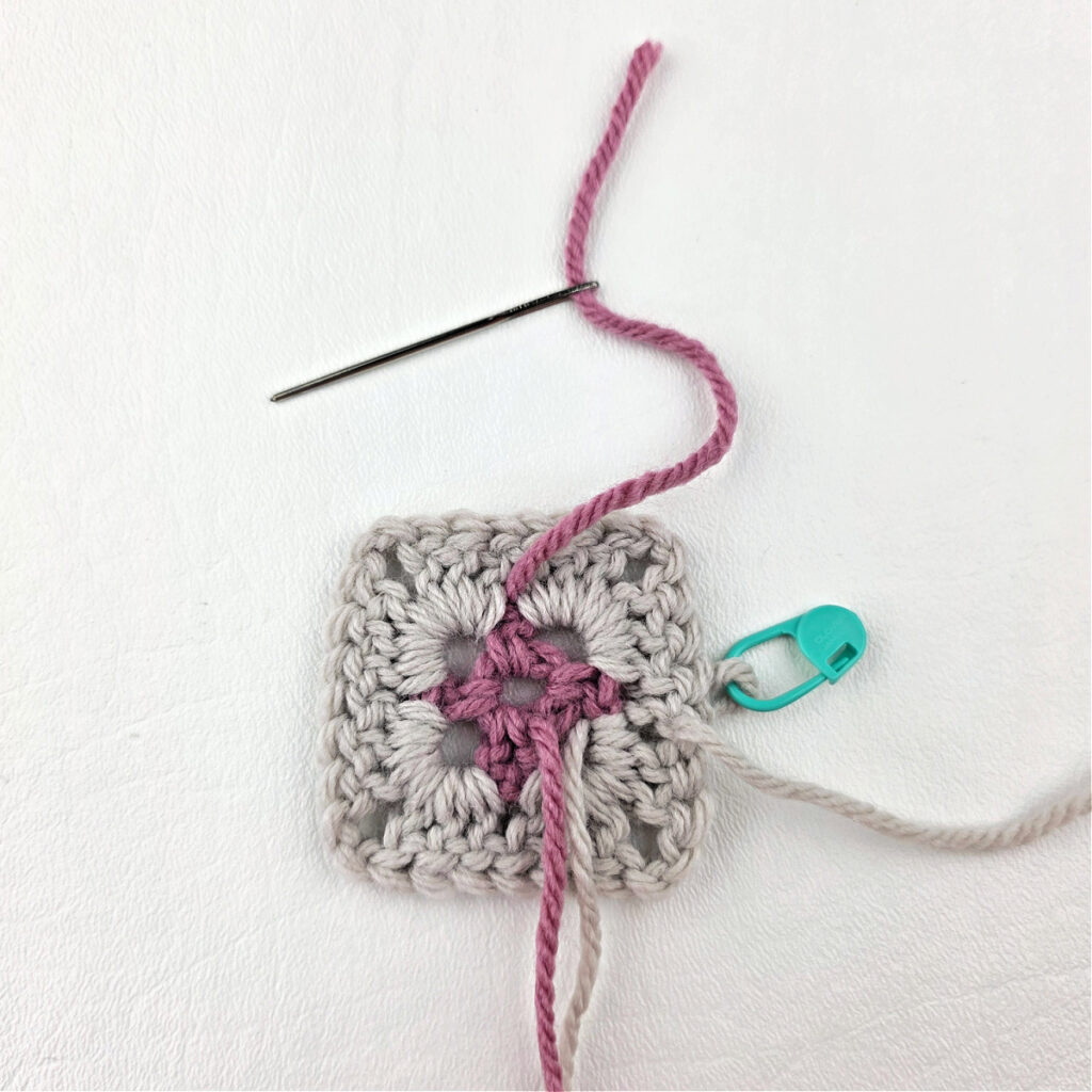 Making a block stitch granny square.