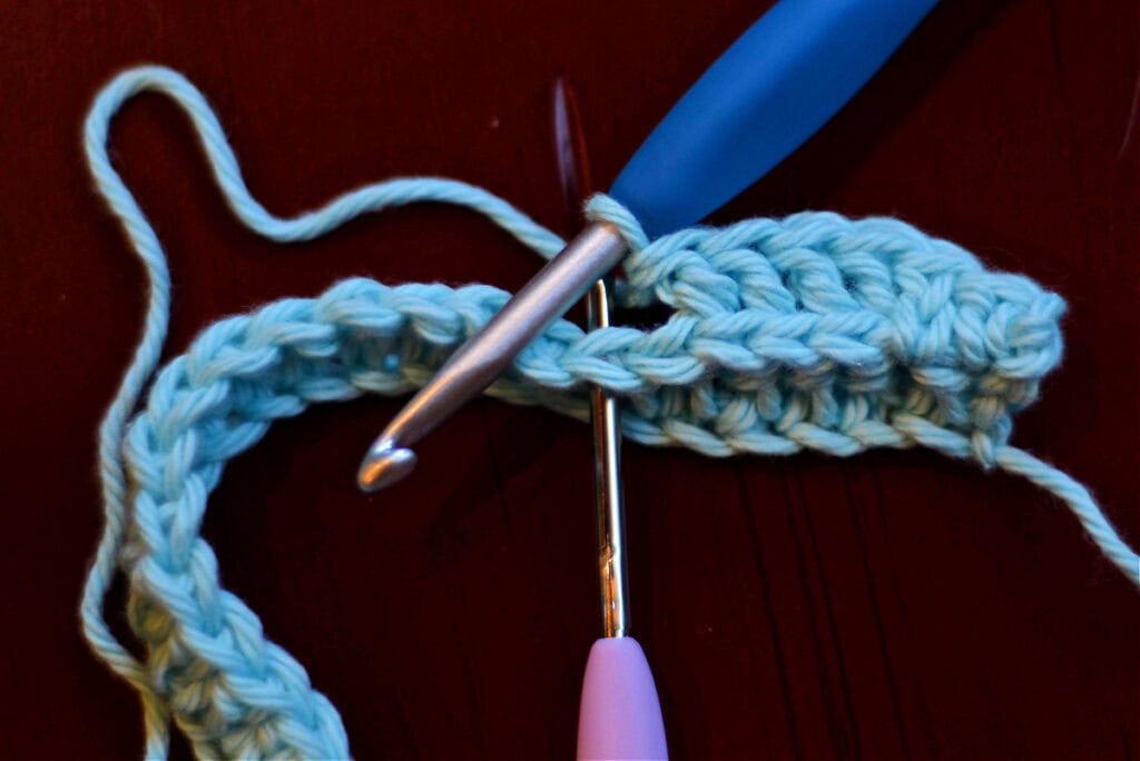 Creating crochet cables with two crochet hooks.
