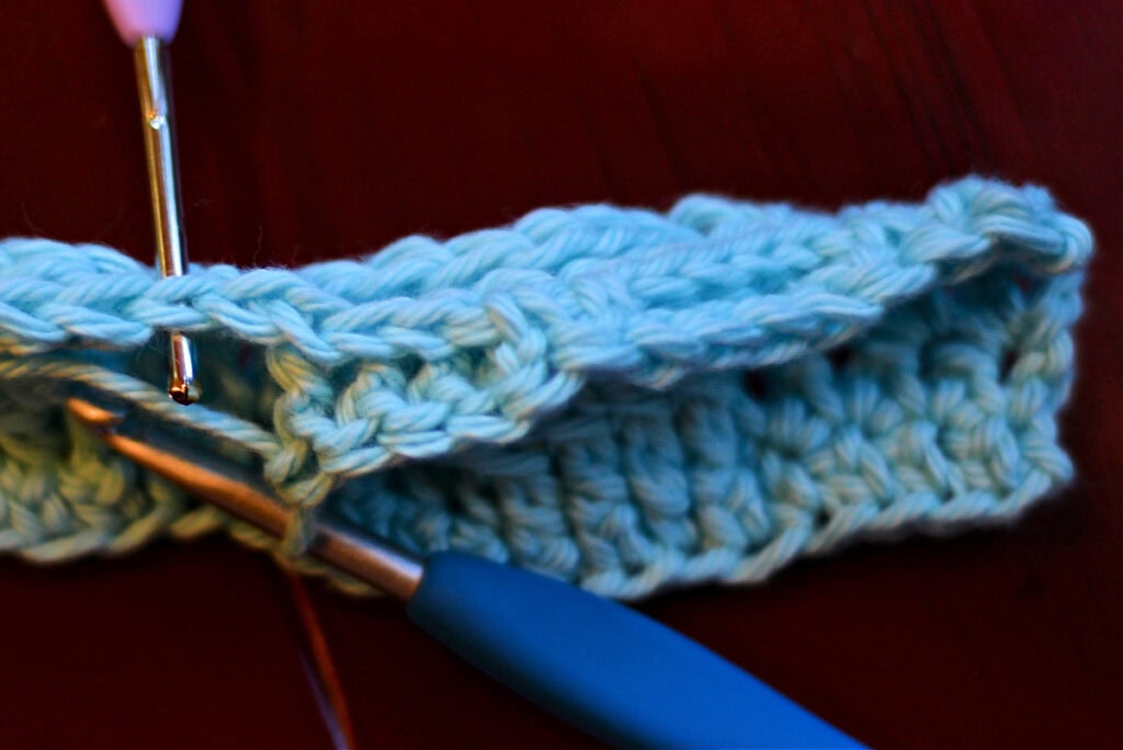 Creating crochet cables with two crochet hooks.