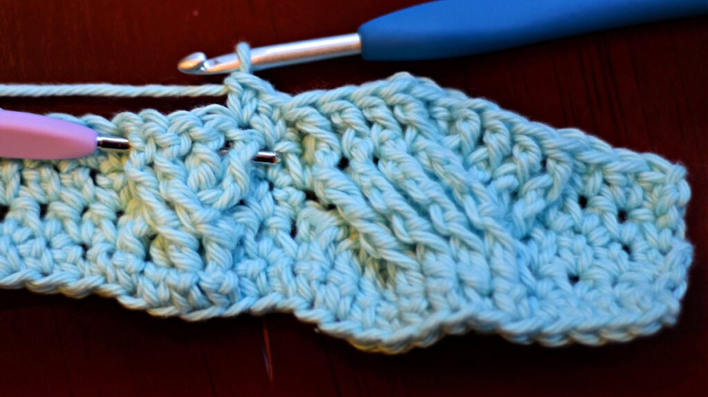 Creating crochet cables with two crochet hooks.