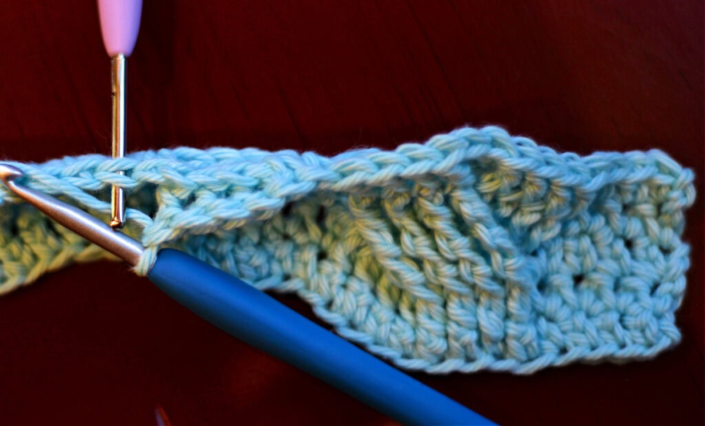 Creating crochet cables with two crochet hooks.