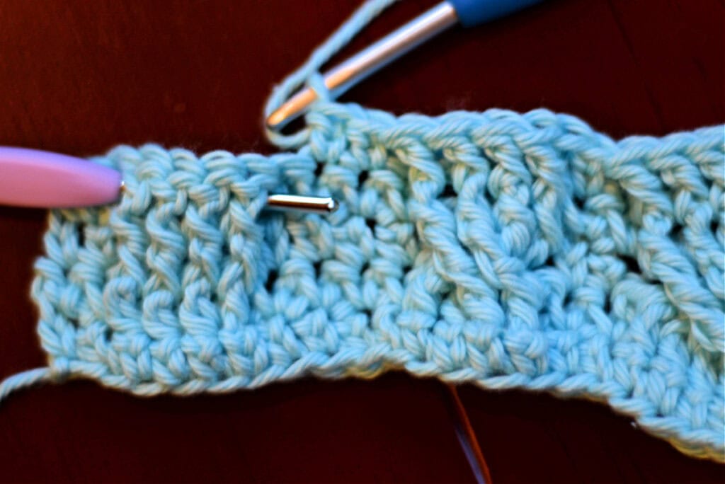 Creating crochet cables with two crochet hooks.