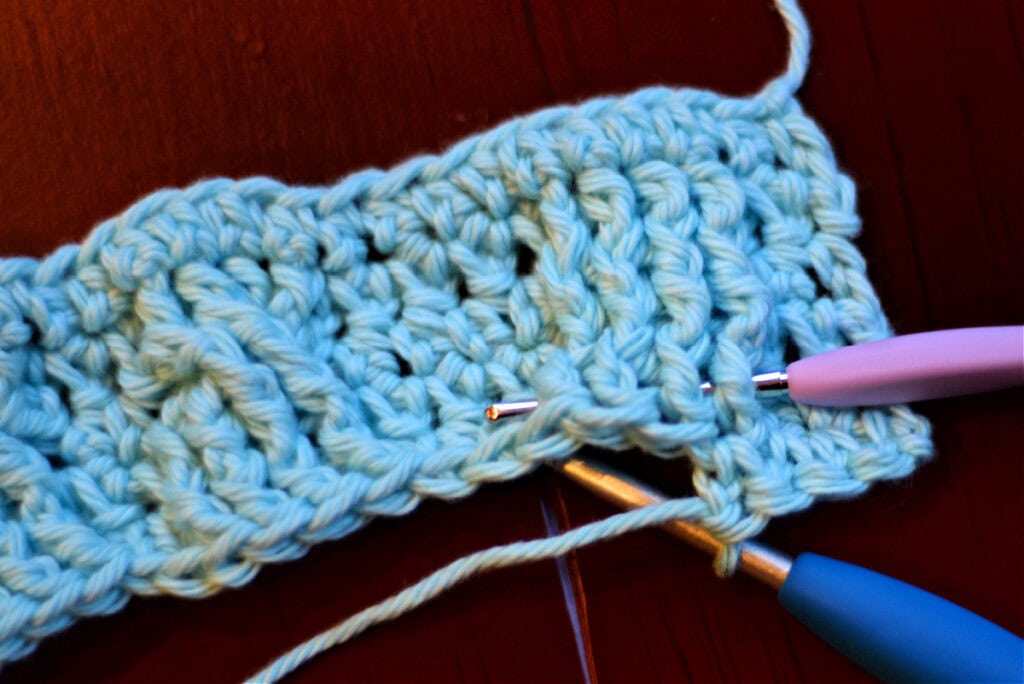 Creating crochet cables with two crochet hooks.