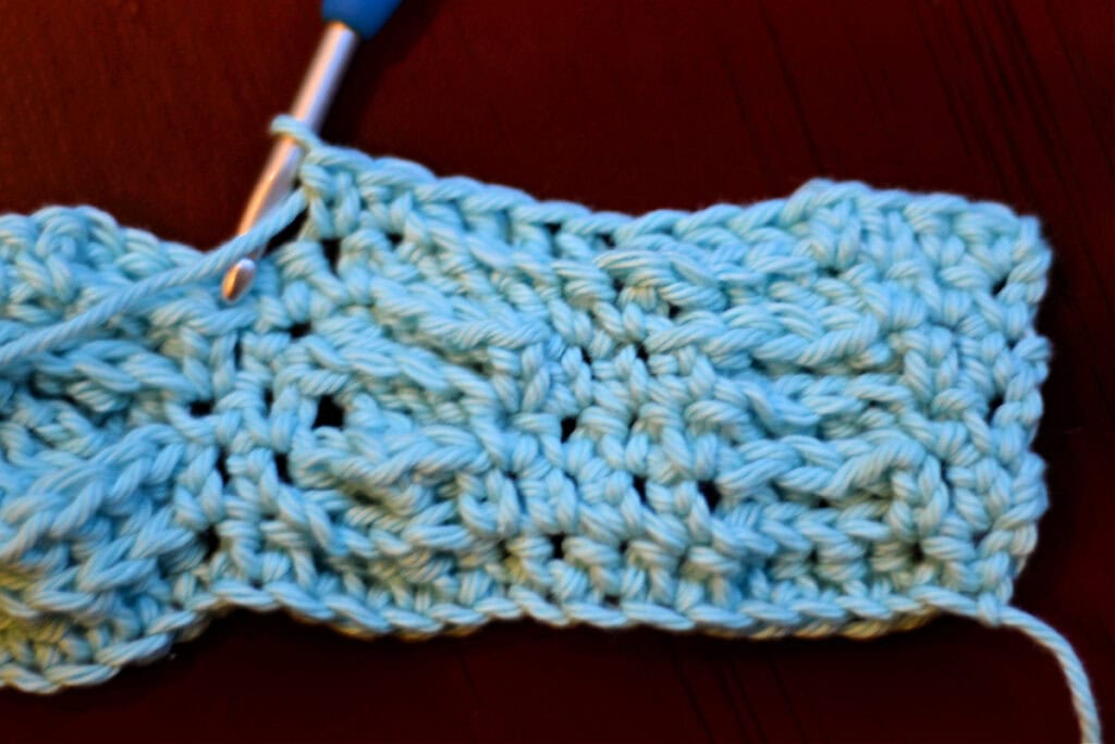 Creating crochet cables with a crochet hook.