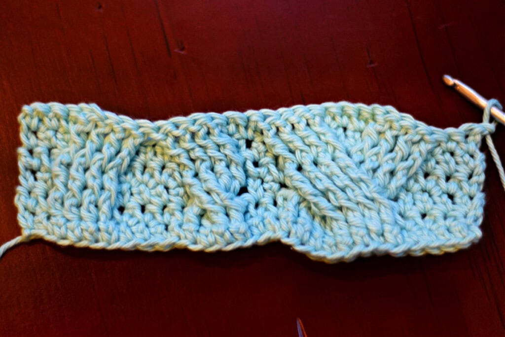 Creating crochet cables with a crochet hook.