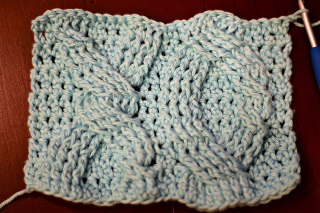 Creating crochet cables with a crochet hook.