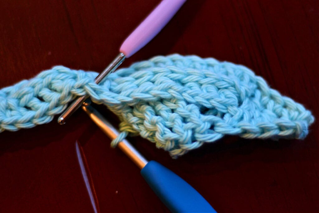 Creating crochet cables with two crochet hooks.