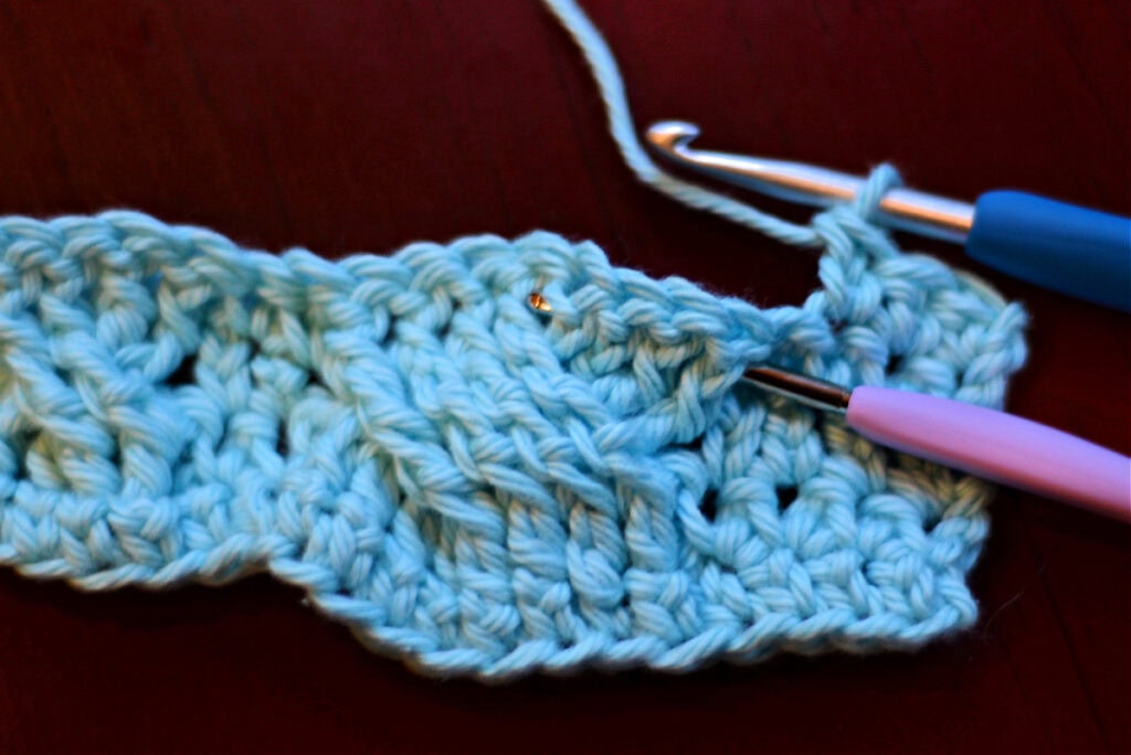 Creating crochet cables with two crochet hooks.