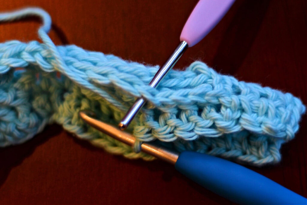 Creating crochet cables with two crochet hooks.