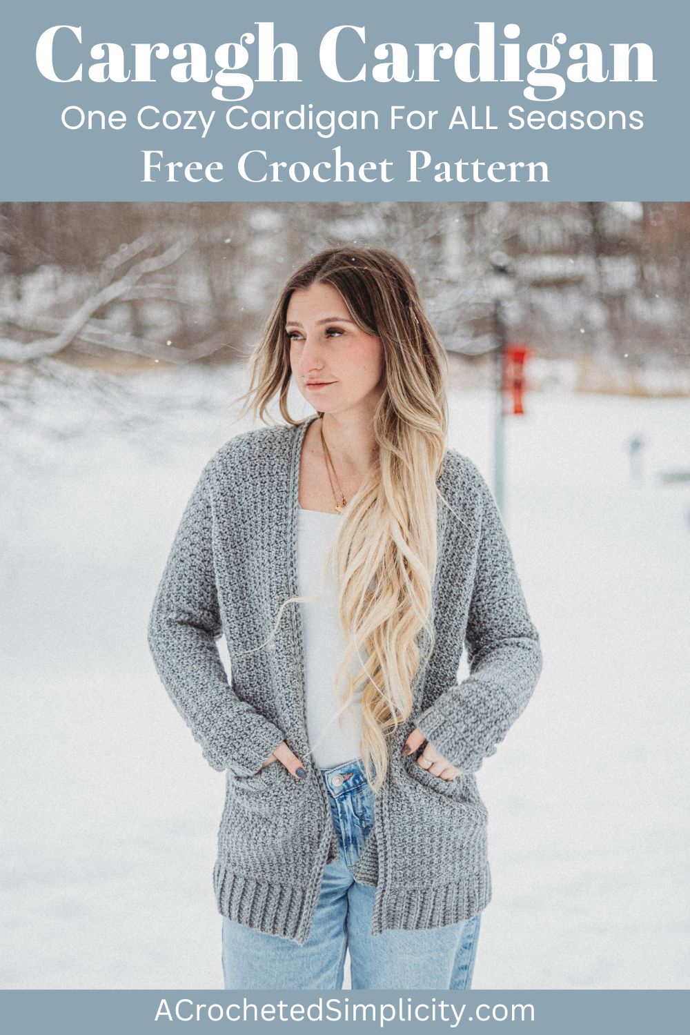 Blonde haired girl wearing a grey crochet cardigan with a white top and jeans.