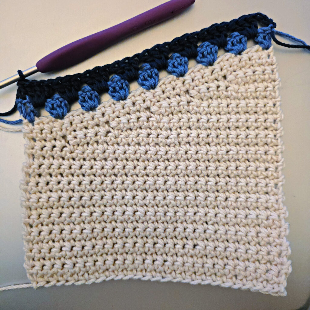 Making the body of a boho crochet crossbody bag.