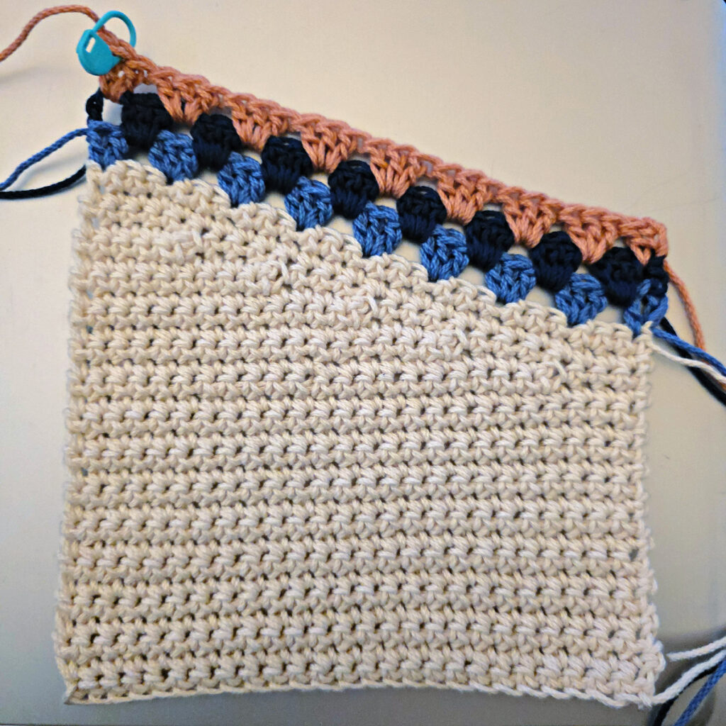 Making the body of a boho crochet crossbody bag.