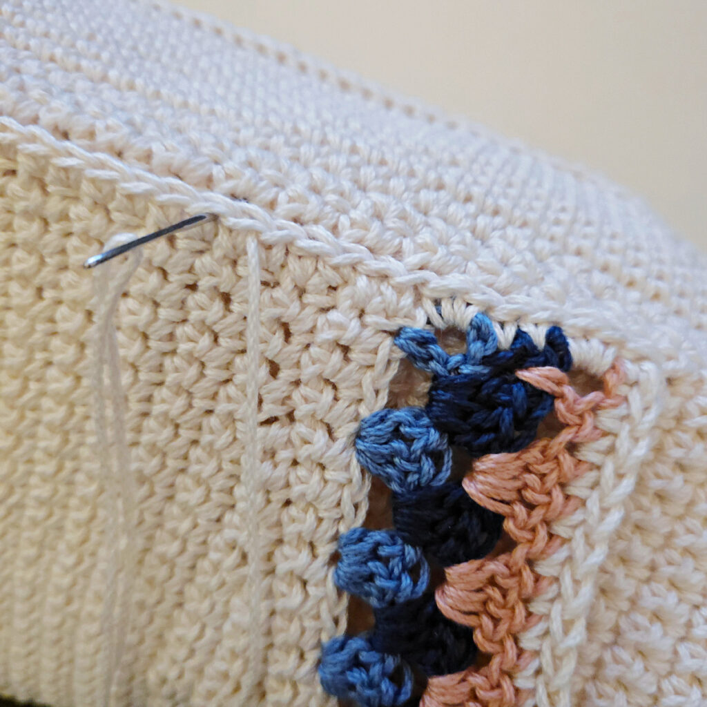 Making the body of a boho crochet crossbody bag.