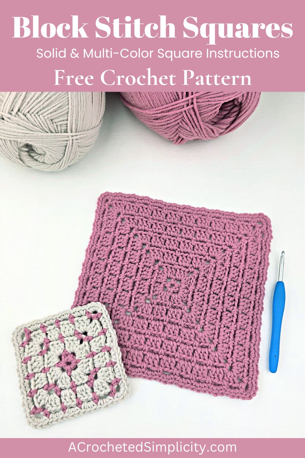 One large pink block stitch granny square and one small white and pink granny square with two balls of yarn in the corner and a blue crochet hook.