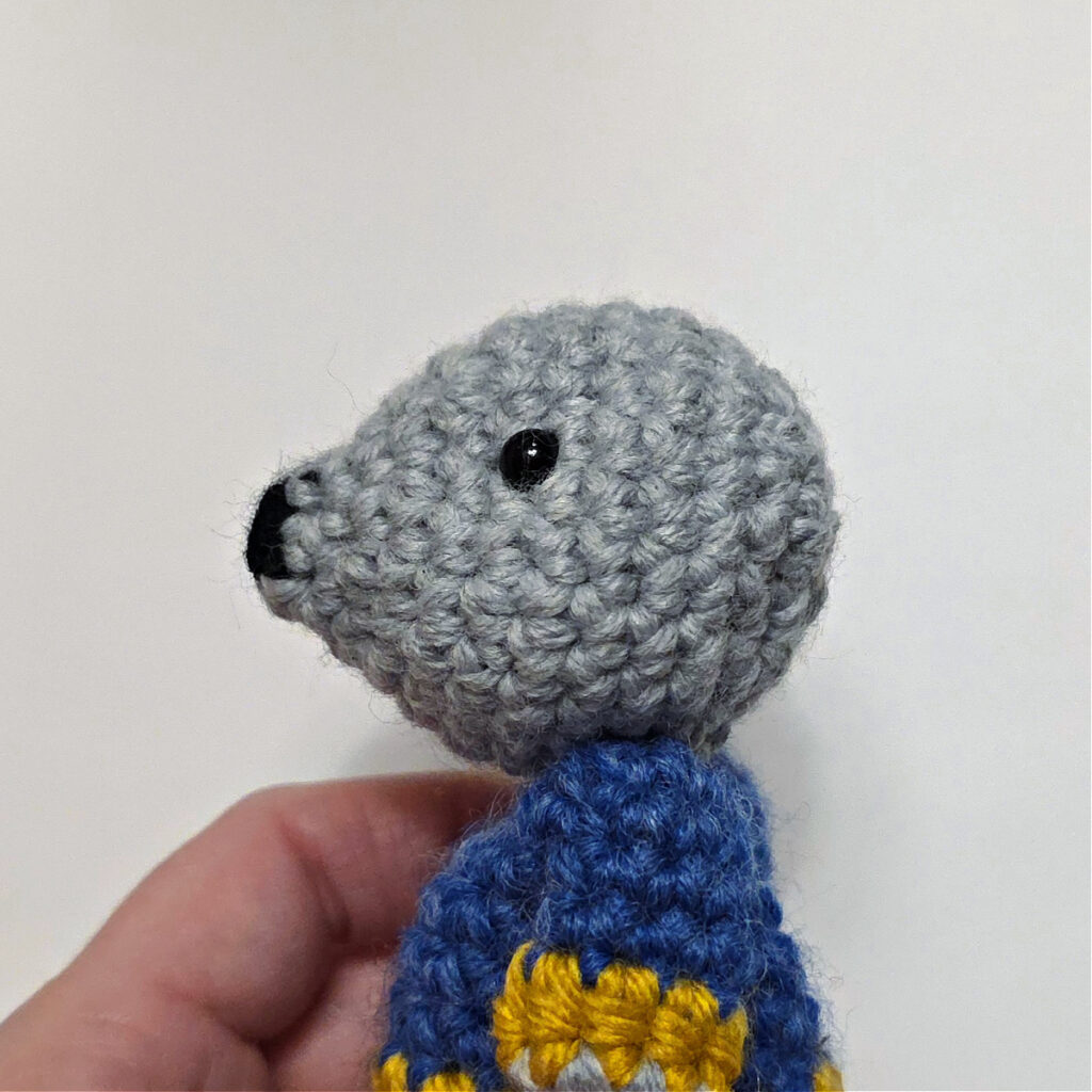 A side view of the mouse after attaching his head to the body.