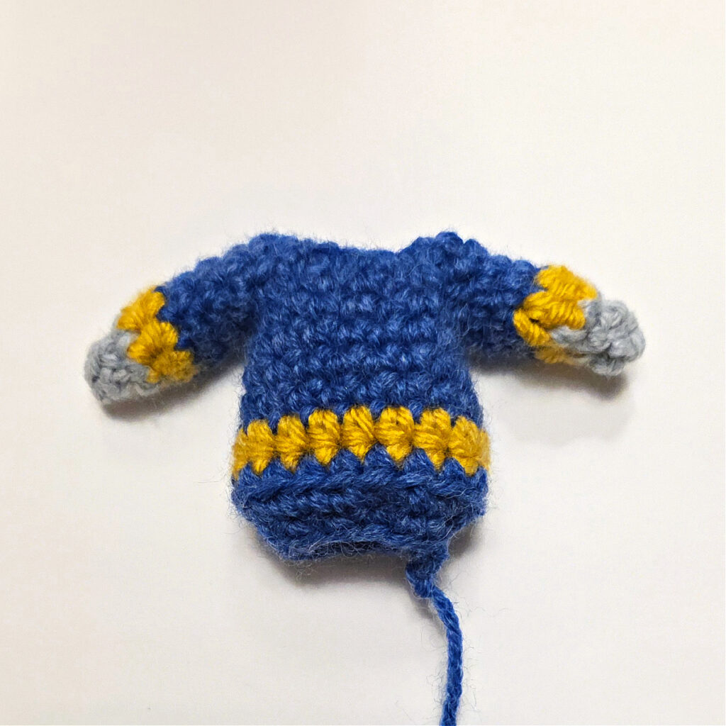 The mouse's body with both arms complete.