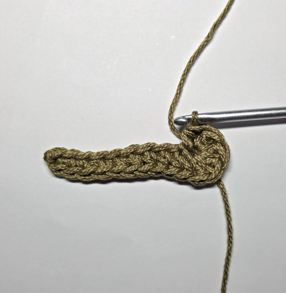 Making a crochet oak leaf.