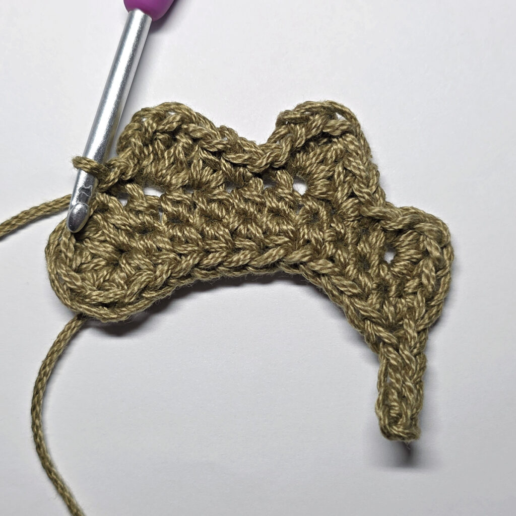 Making a crochet oak leaf.