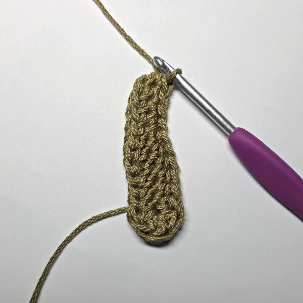 Making a crochet oak leaf.