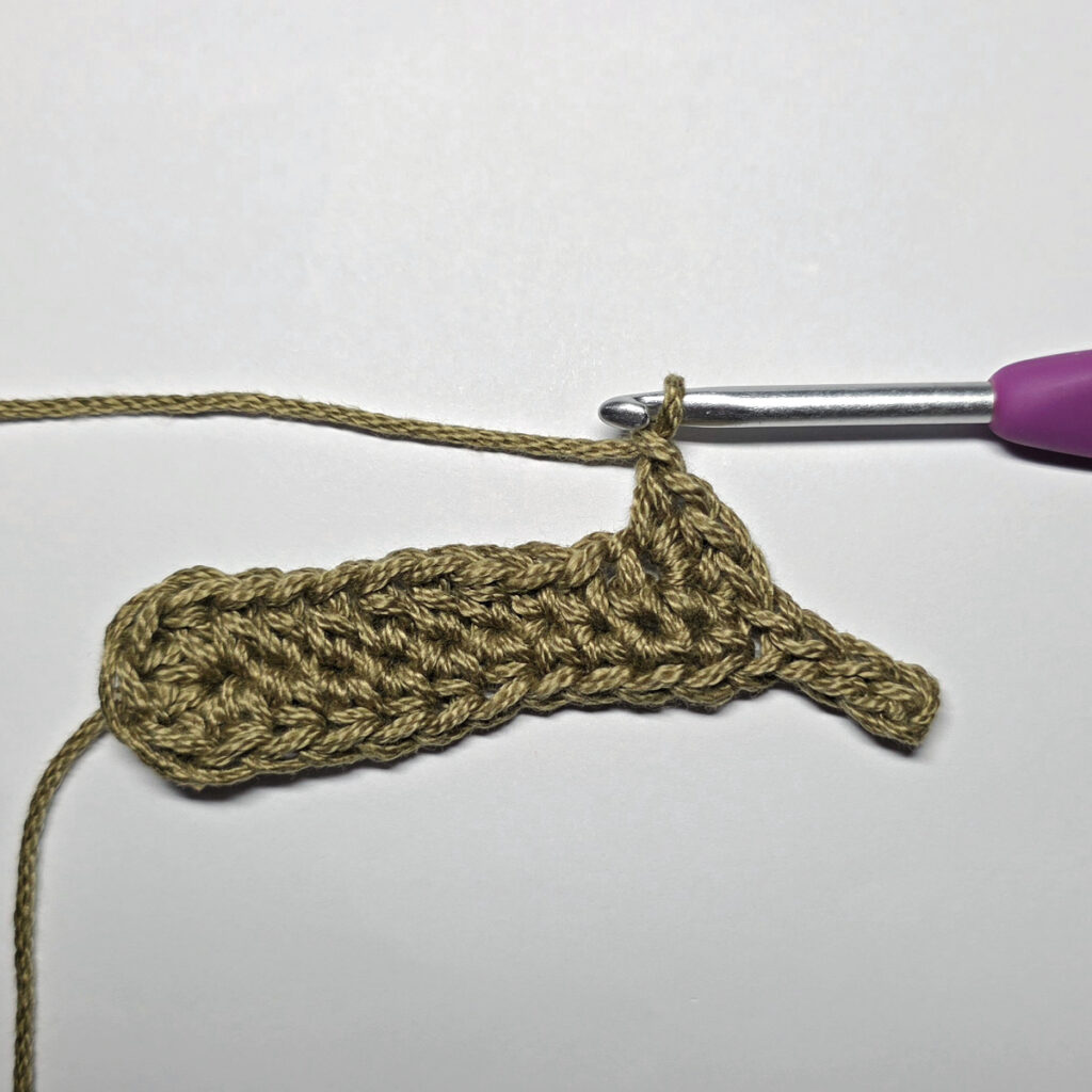 Making a crochet oak leaf.