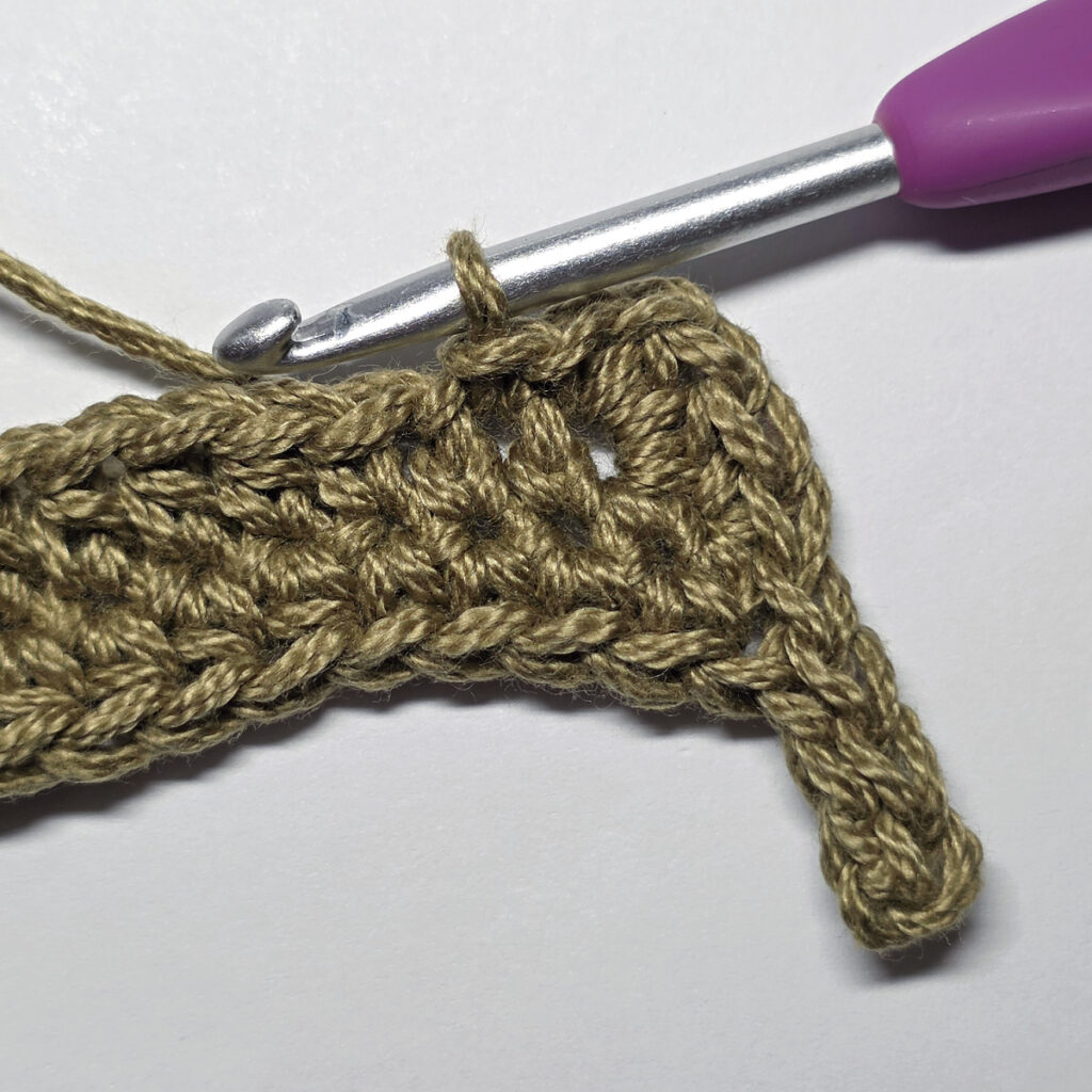 Making a crochet oak leaf.