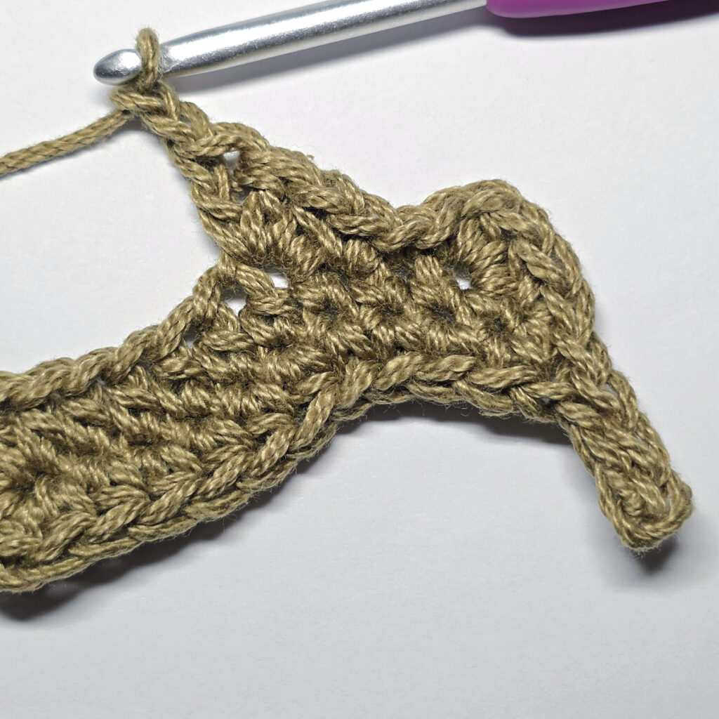 Making a crochet oak leaf.