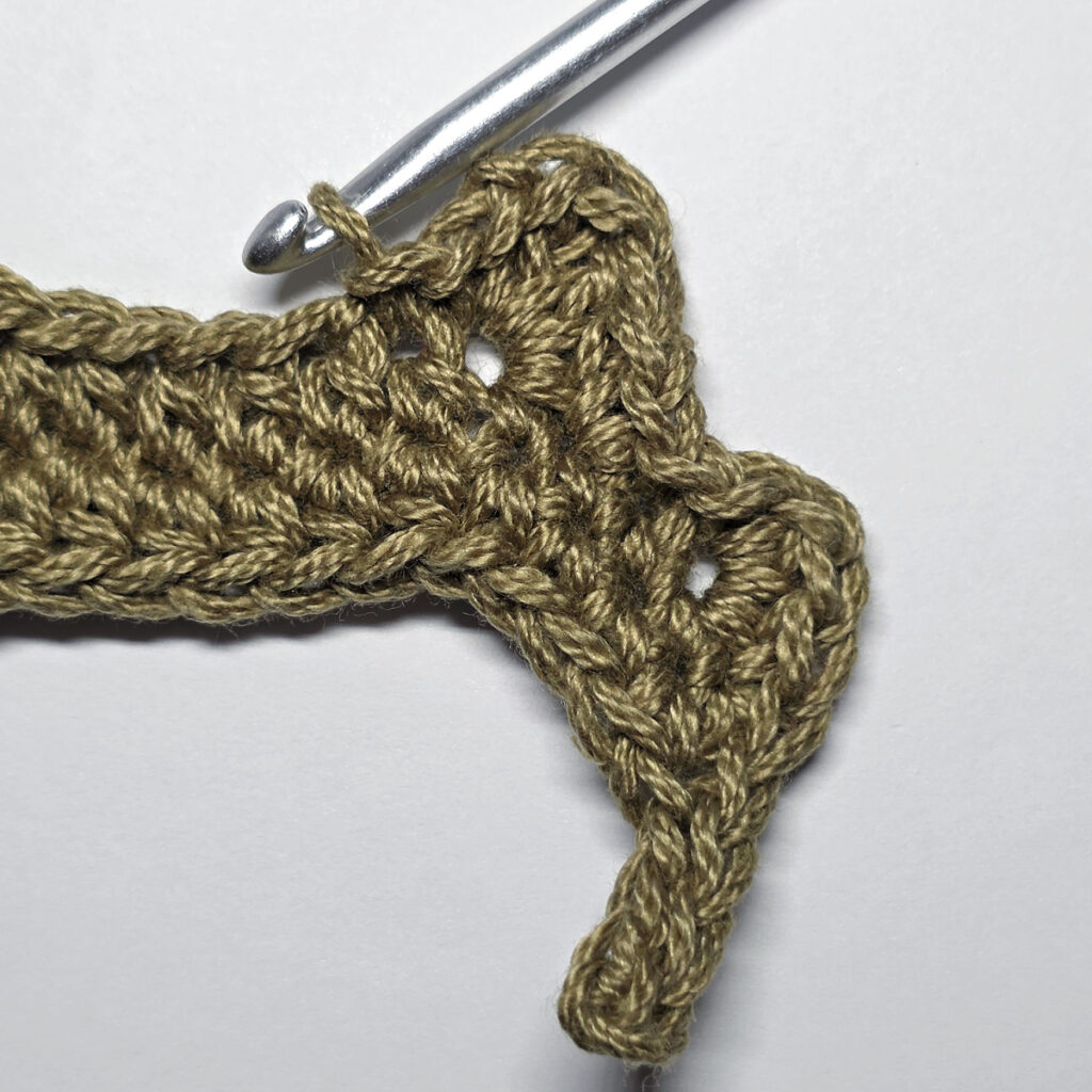 Making a crochet oak leaf.