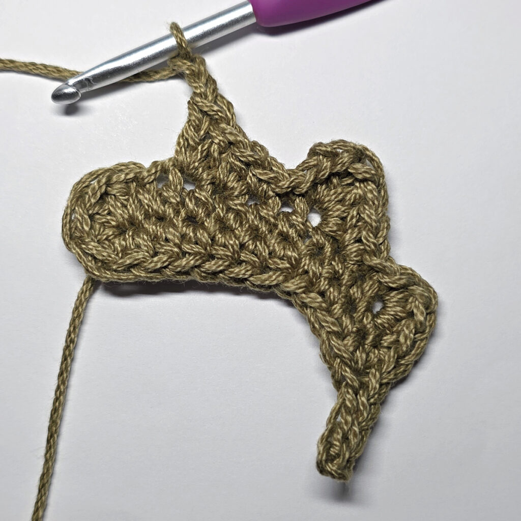Making a crochet oak leaf.