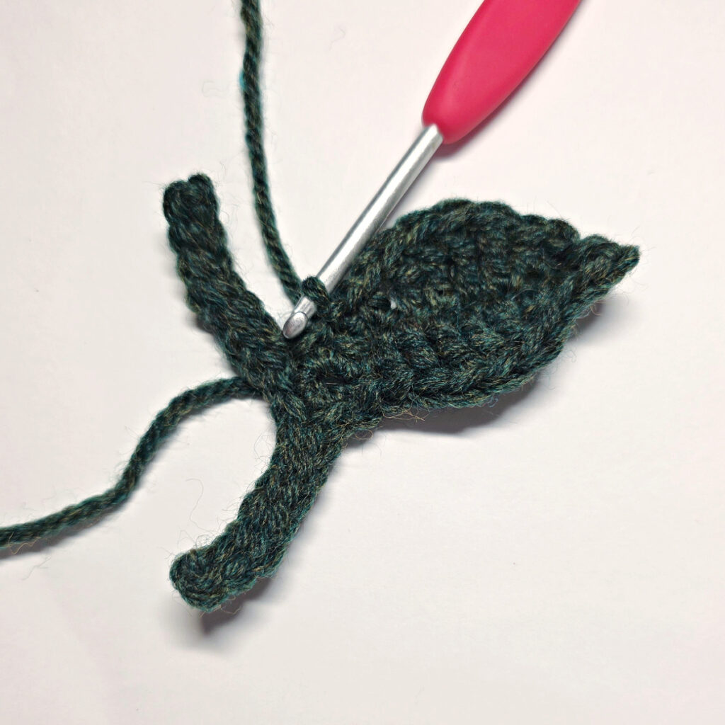 The first leaf crocheted in round three.