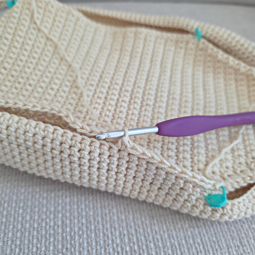 Making the body of a boho crochet crossbody bag.