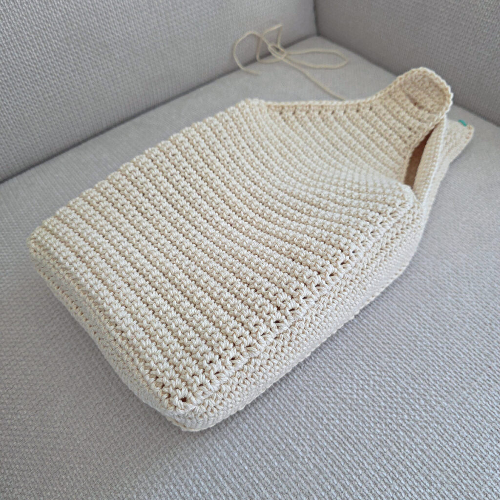 Making the body of a boho crochet crossbody bag.