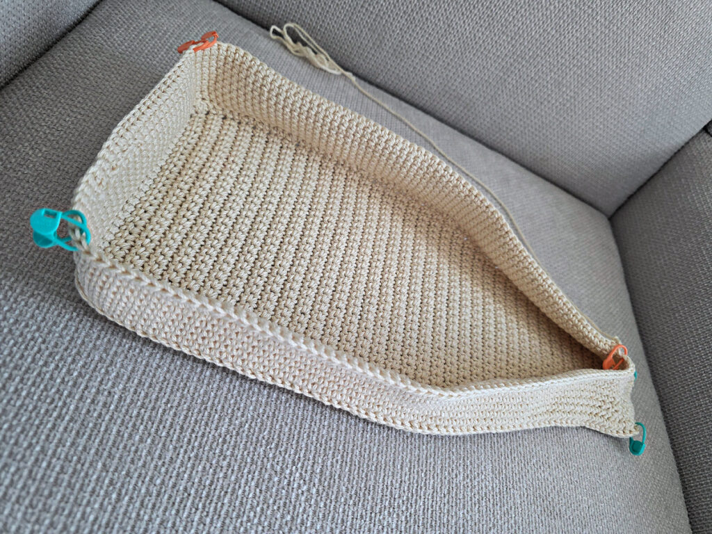 Making the body of a boho crochet crossbody bag.