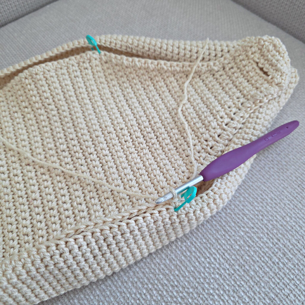 Making the body of a boho crochet crossbody bag.