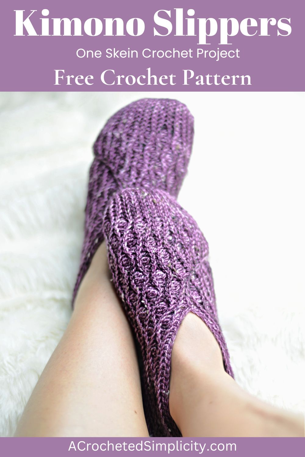 Purple crochet kimono slippers on feet against a white background.