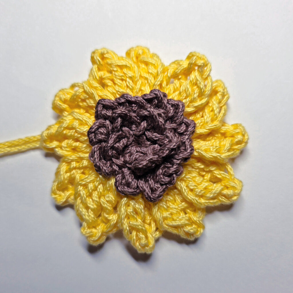 A completed crochet sunflower.