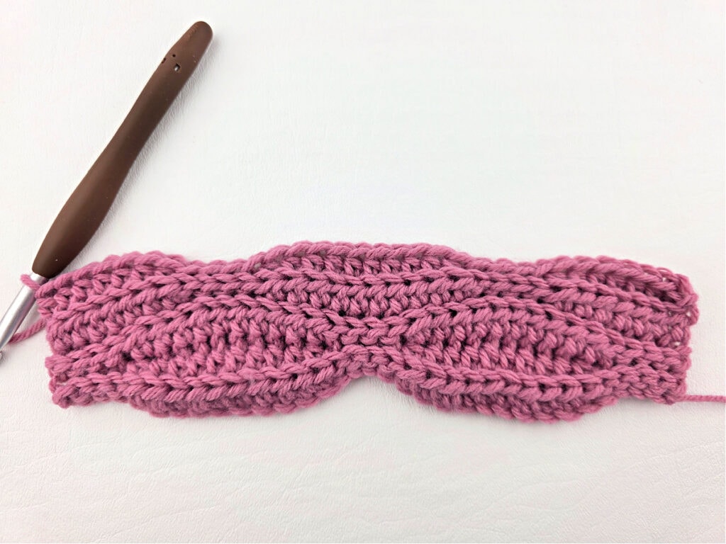 Creating a crochet wave stitch swatch.