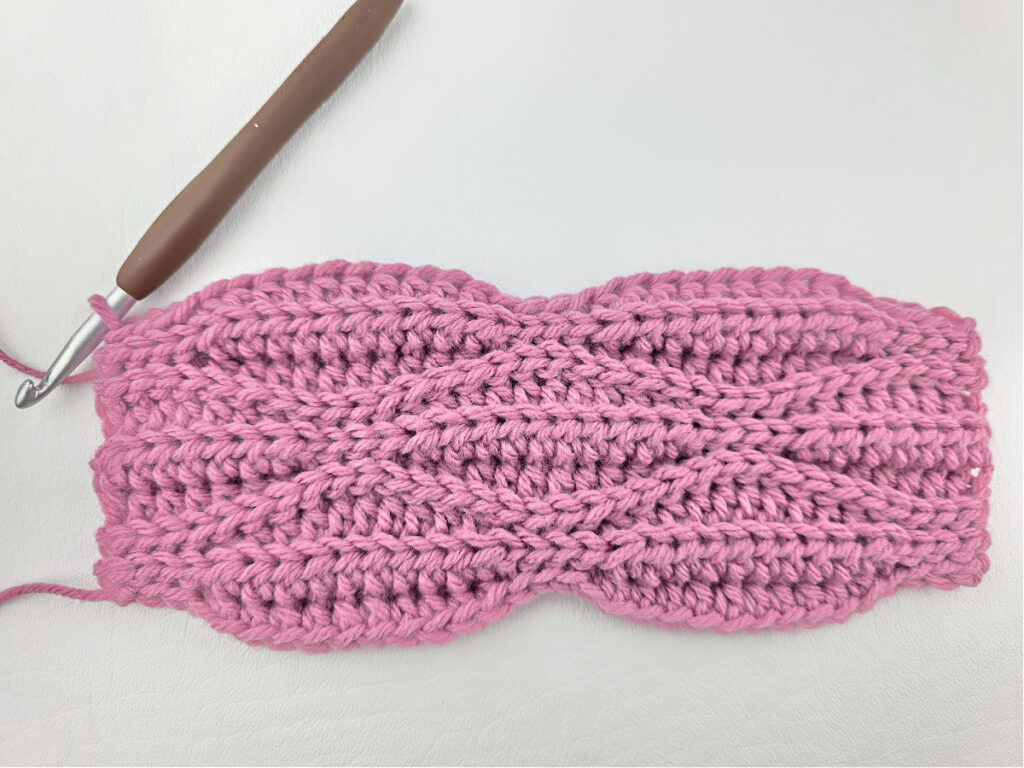 Creating a crochet wave stitch swatch.