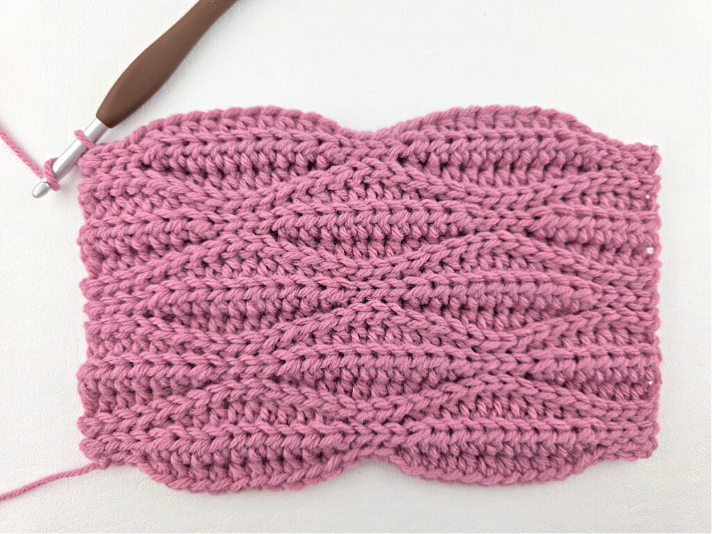 Creating a crochet wave stitch swatch.