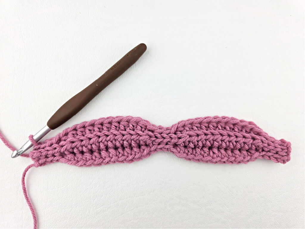 Creating a crochet wave stitch swatch.