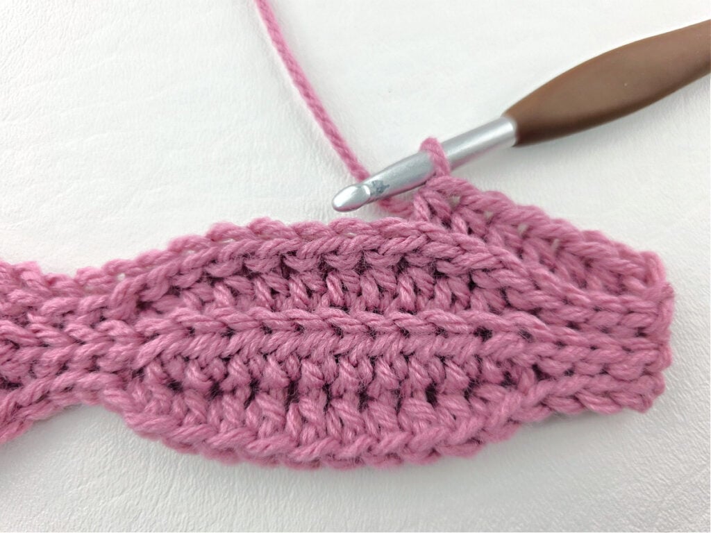 Creating a crochet wave stitch swatch.