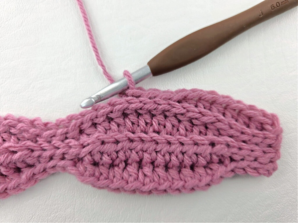 Creating a crochet wave stitch swatch.